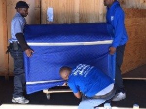 My Guys movers padding furniture