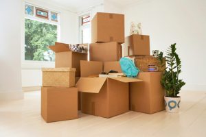 Stack of boxes in an empty room